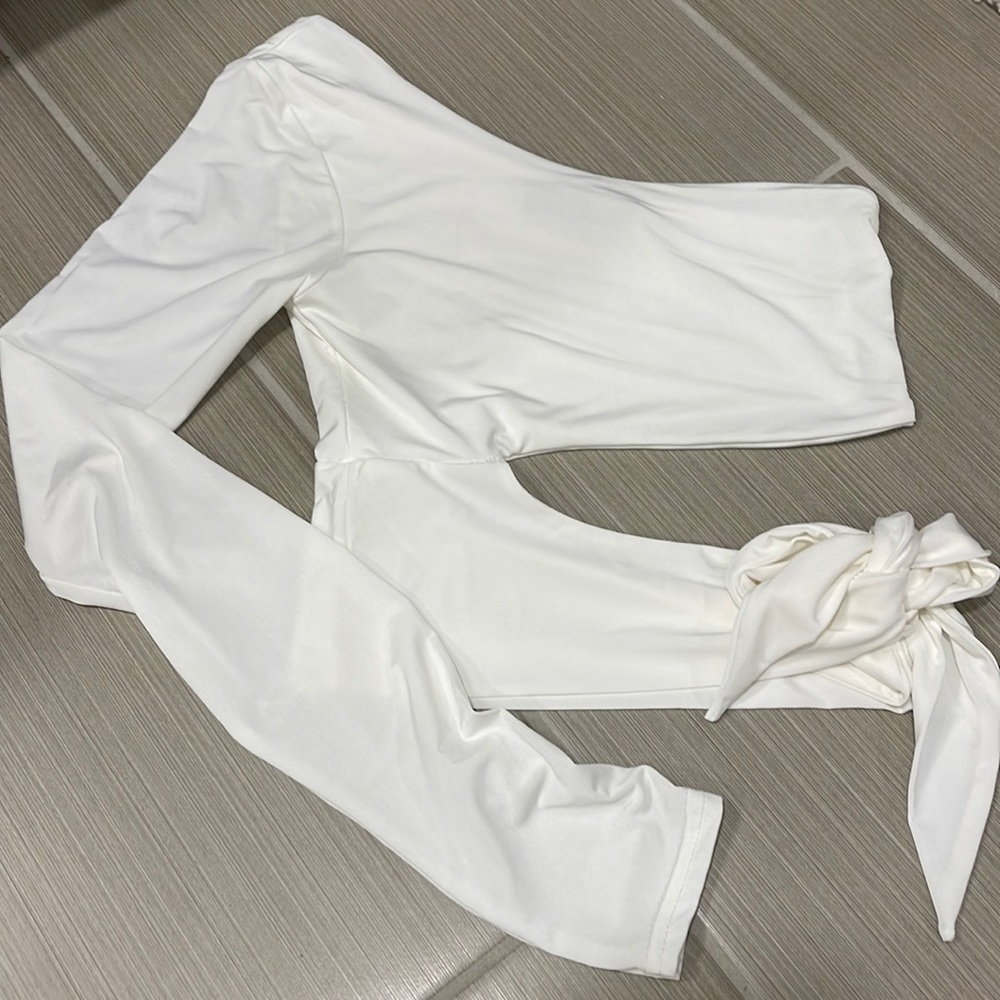 White one shoulder long sleeve with cut out